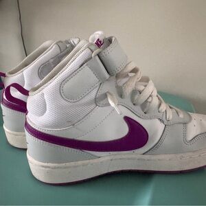Nike White High-Top Sneakers with Purple Swoosh Accent